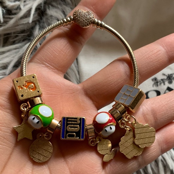 Pandora Rose Gold Pave Heart Clasp Bracelet w/ Super Mario Bros. Themed Charms. - Picture 11 of 14